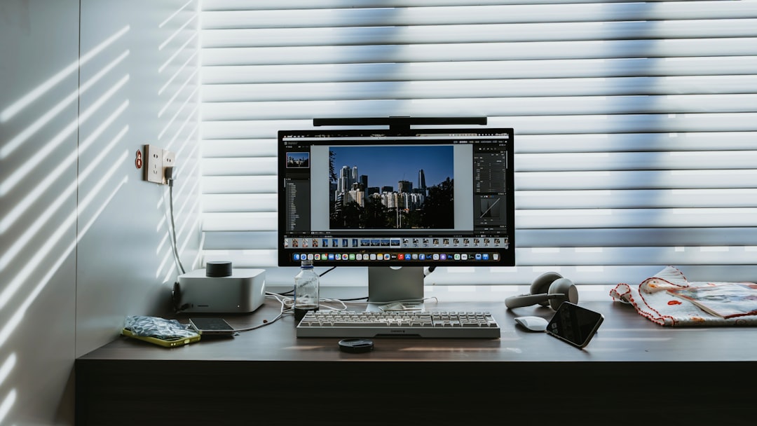 Modern professional desk setup with ergonomic peripherals